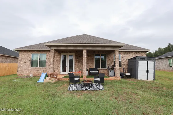 a view of a house with patio
