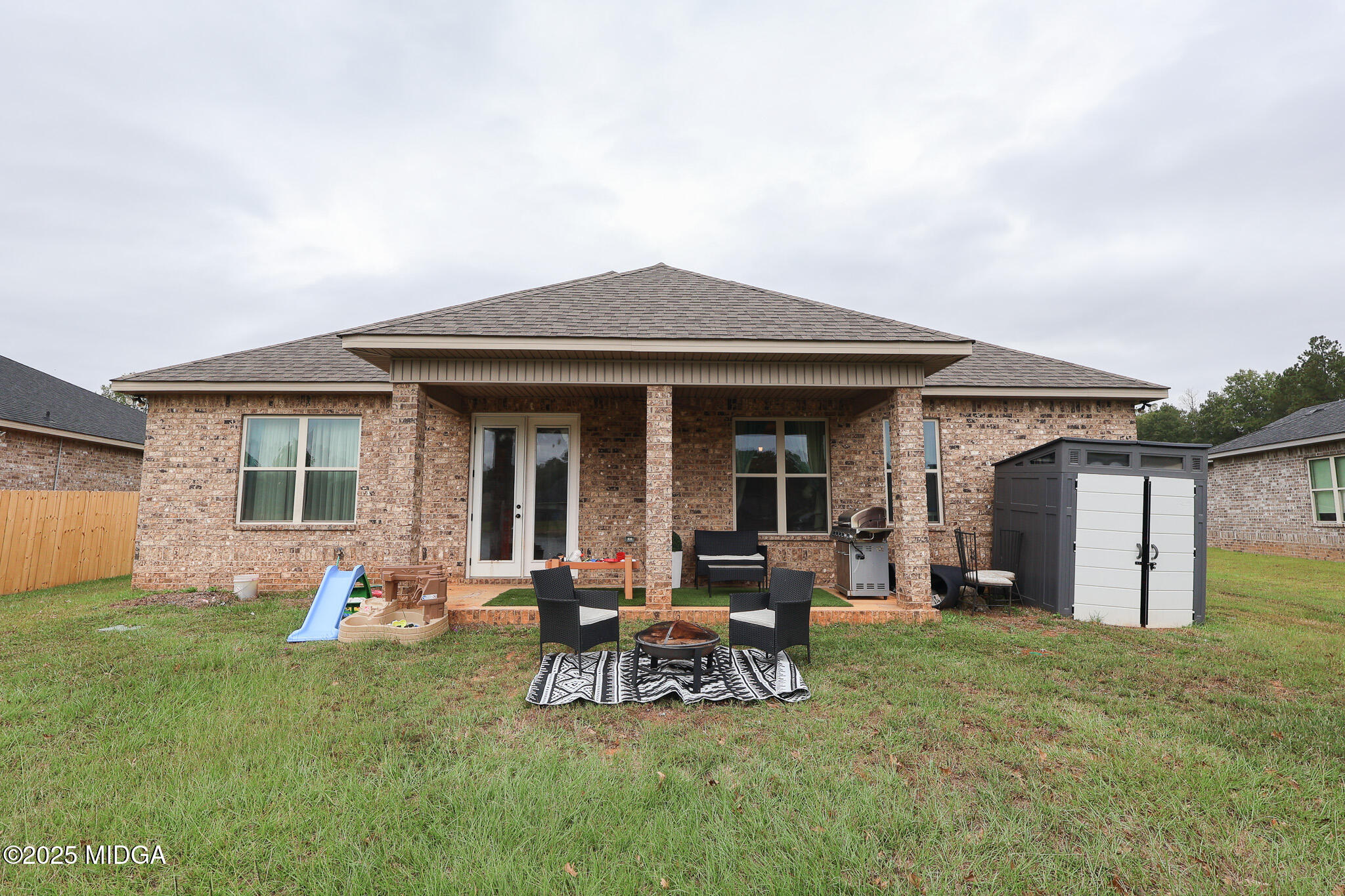 110 Gwendolyn Avenue Perry, GA 31069 - Photo 22 of 23 a view of a house with patio
