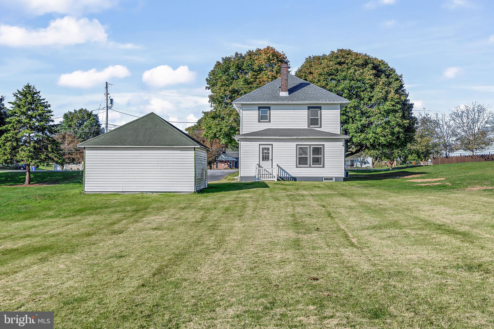 206 Hershey Road Hummelstown, PA 17036 - Photo 23 of 26 a front view of a house with a yard