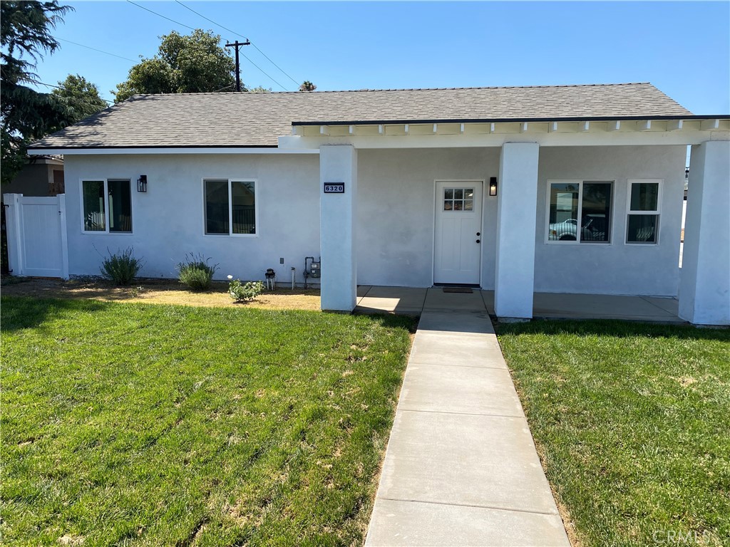 6320 Jones Avenue Riverside, CA 92505 - Photo 1 of 1 a front view of a house with garden