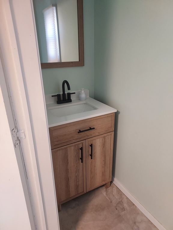 2 Upland Road Taunton, MA 02780 - Photo 12 of 21 a view of a sink and a mirror
