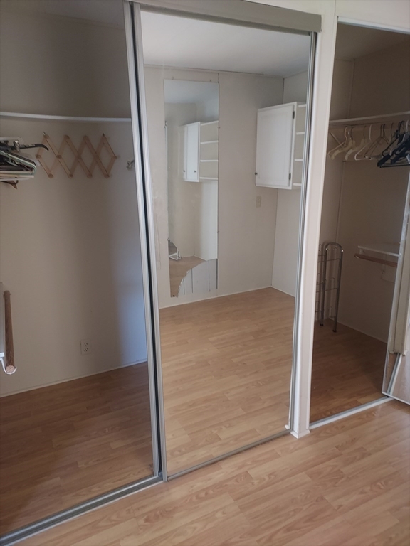 2 Upland Road Taunton, MA 02780 - Photo 18 of 21 an empty room with wooden floor