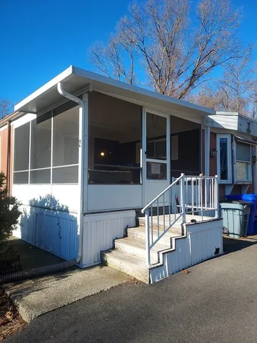a view of house with outdoor space