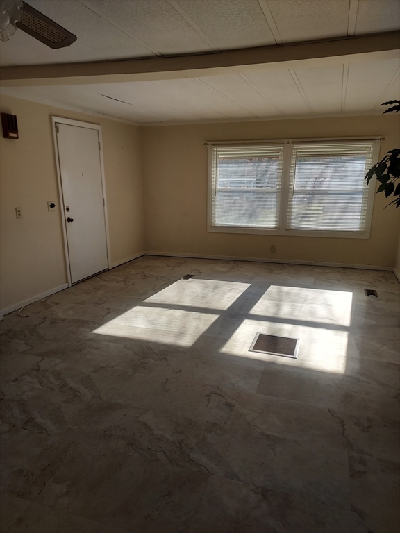 2 Upland Road Taunton, MA 02780 - Photo 9 of 21 a view of an empty room and window