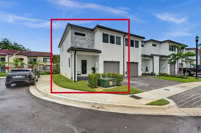 a house with trees in front of it