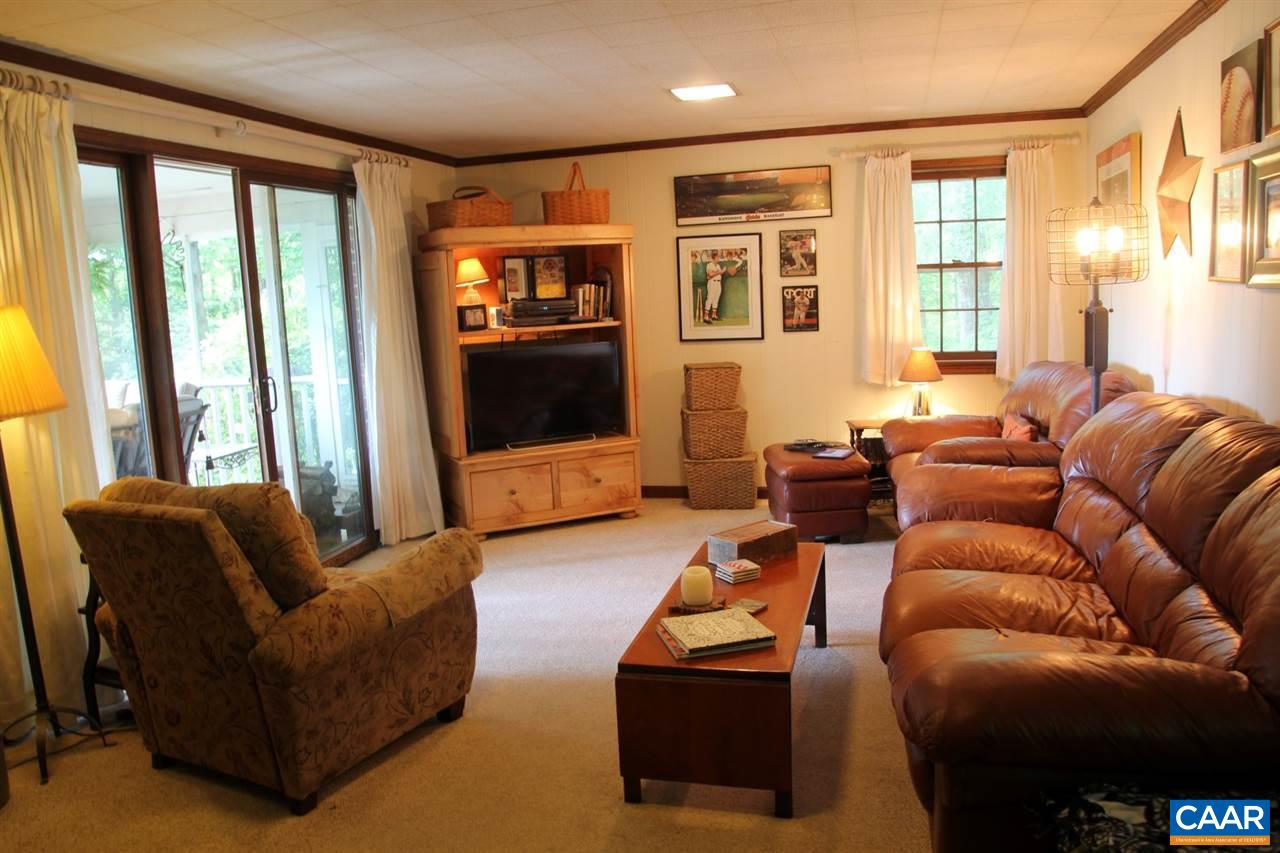 88 Good Hope Church Road Aroda, VA 22709 - Photo 10 of 30 a living room with furniture and a flat screen tv