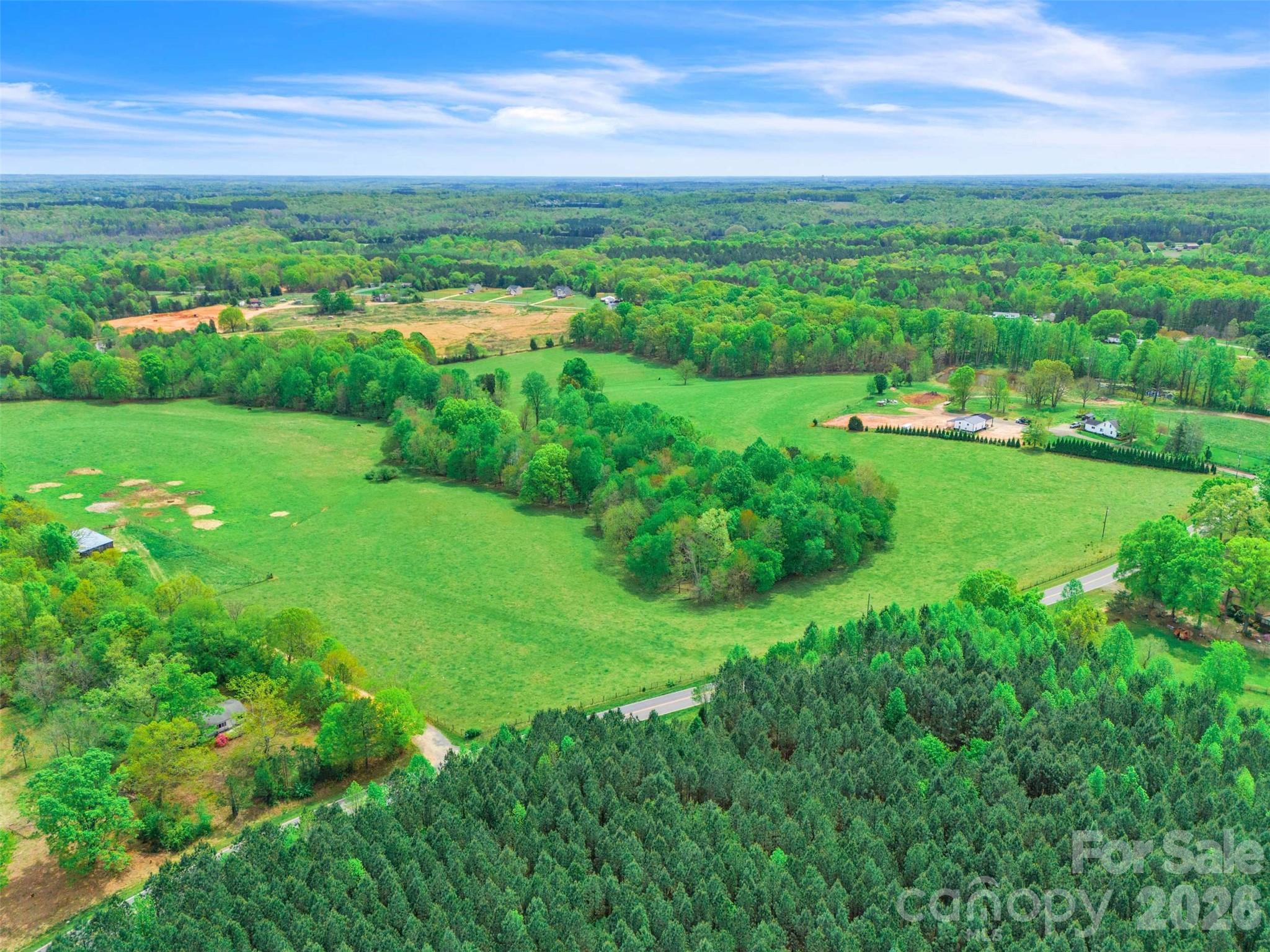 1376-2 Lowrance Road Catawba, NC 28609 - Photo 7 of 9 a view of a green yard with large trees