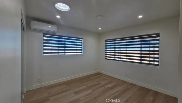 a view of cabinets and wooden floor