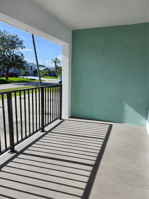 2921 Vasco Street, Unit B Punta Gorda, FL 33950 - Photo 2 of 10 a view of a balcony with wooden floor