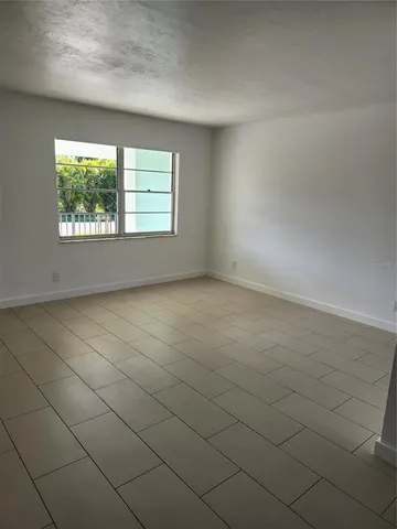 an empty room with a window