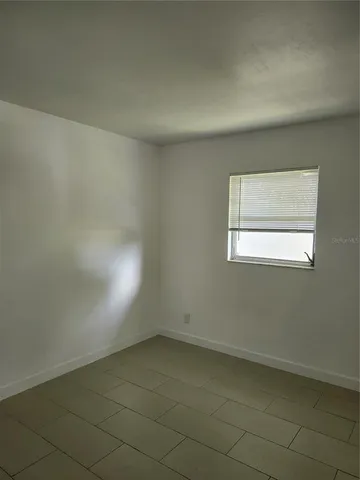 an empty room with a window