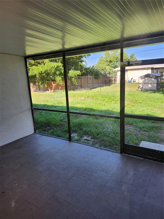 2921 Vasco Street, Unit B Punta Gorda, FL 33950 - Photo 10 of 10 a view of a yard with porch