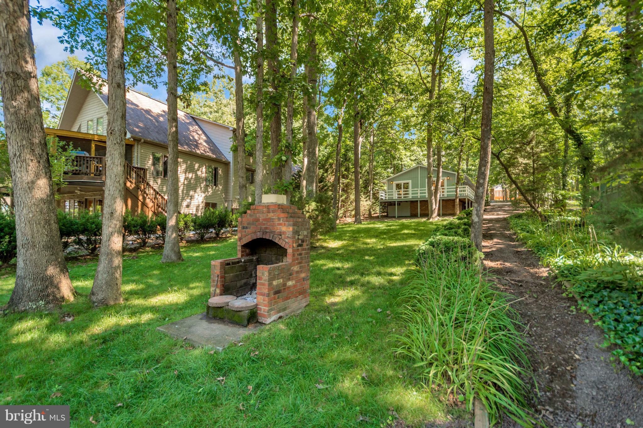 105 Greenspring Road Locust Grove, VA 22508 - Photo 12 of 30 Plush yard and BBQ area right next to your dock