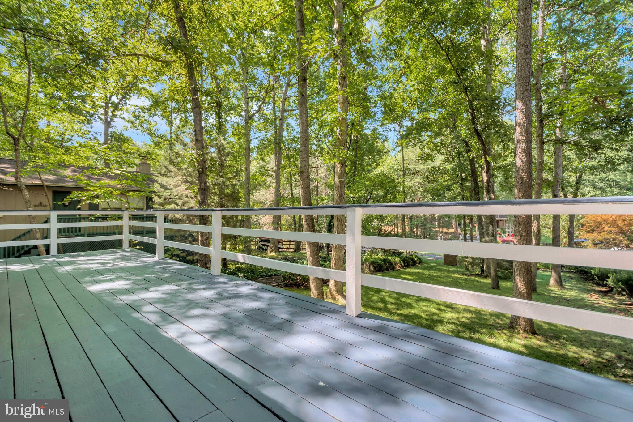 105 Greenspring Road Locust Grove, VA 22508 - Photo 9 of 30 Expansive deck with shade and water views