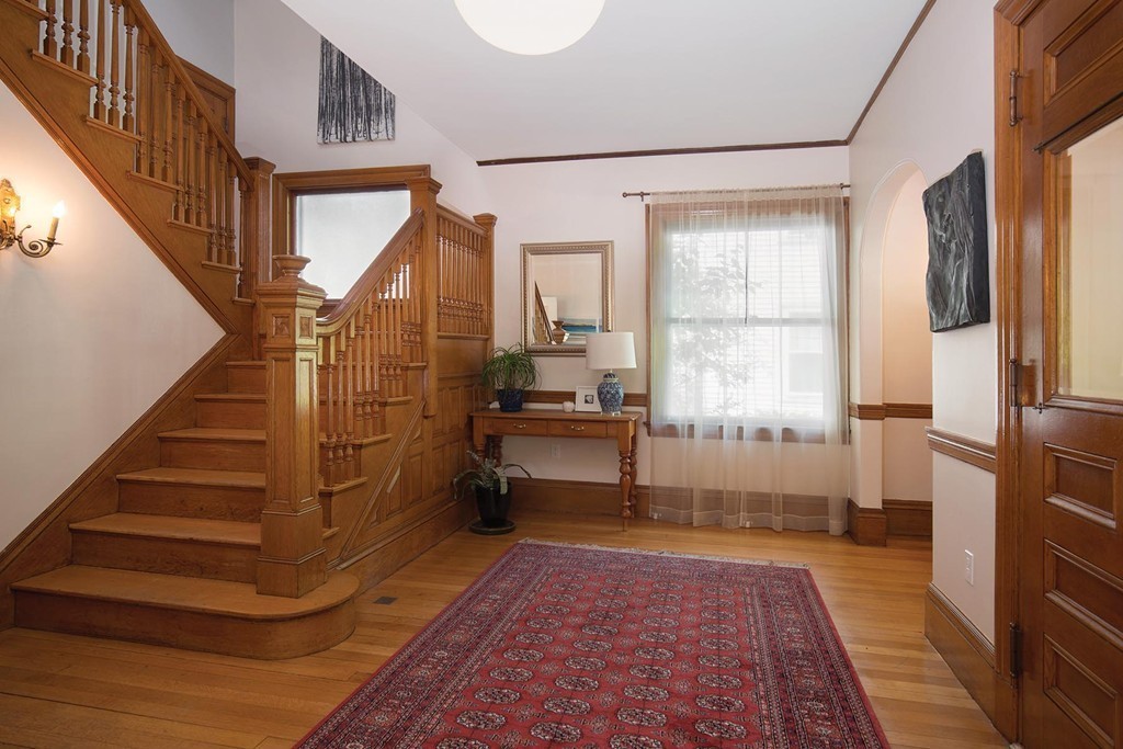 14 Milton Road Brookline, MA 02445 - Photo 2 of 10 a view of entryway and hall with wooden floor