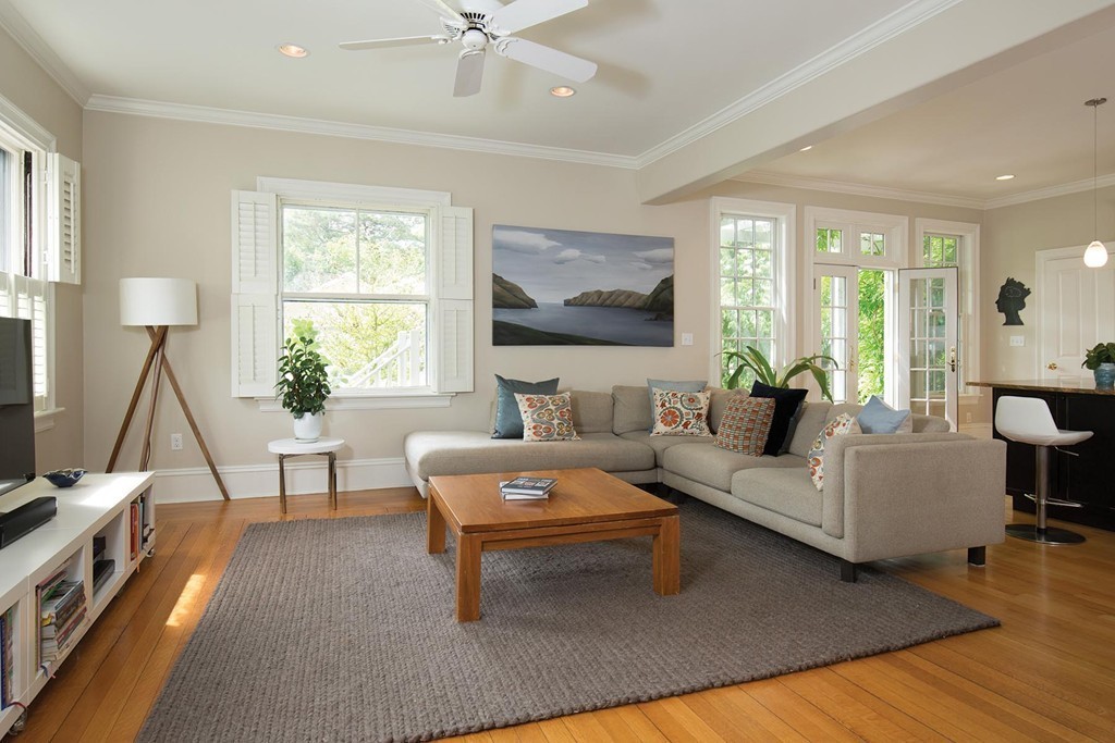 14 Milton Road Brookline, MA 02445 - Photo 5 of 10 a living room with furniture and a flat screen tv