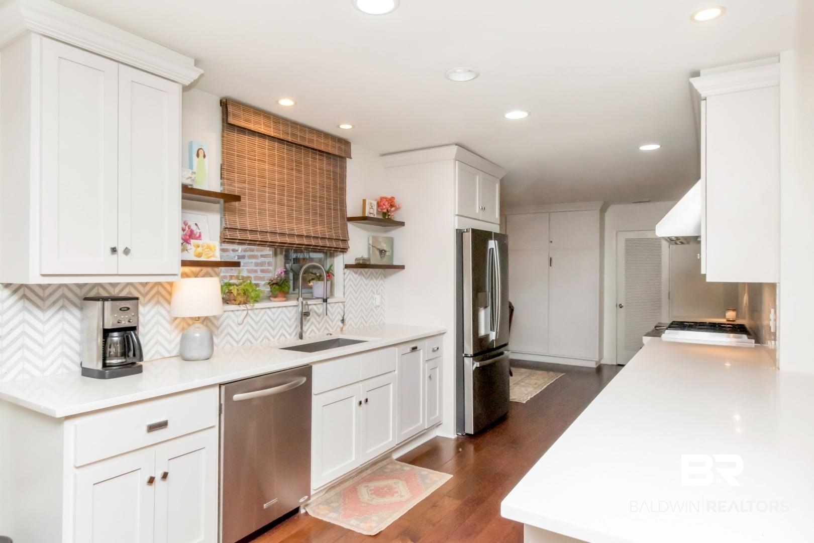 154 Fenwick Road Mobile, AL 36608 - Photo 17 of 48 Kitchen featuring white cabinets, stainless steel appliances, dark wood-type flooring, open shelves, and recessed lighting