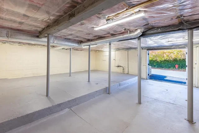 a view of an empty room with a sliding door