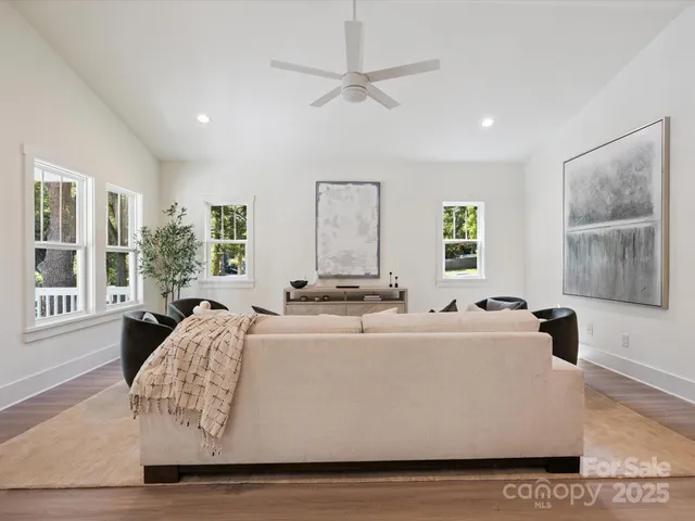 a living room with furniture and window