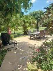a view of a lake with houses in the back