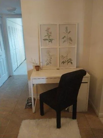 a living room with a table and a window