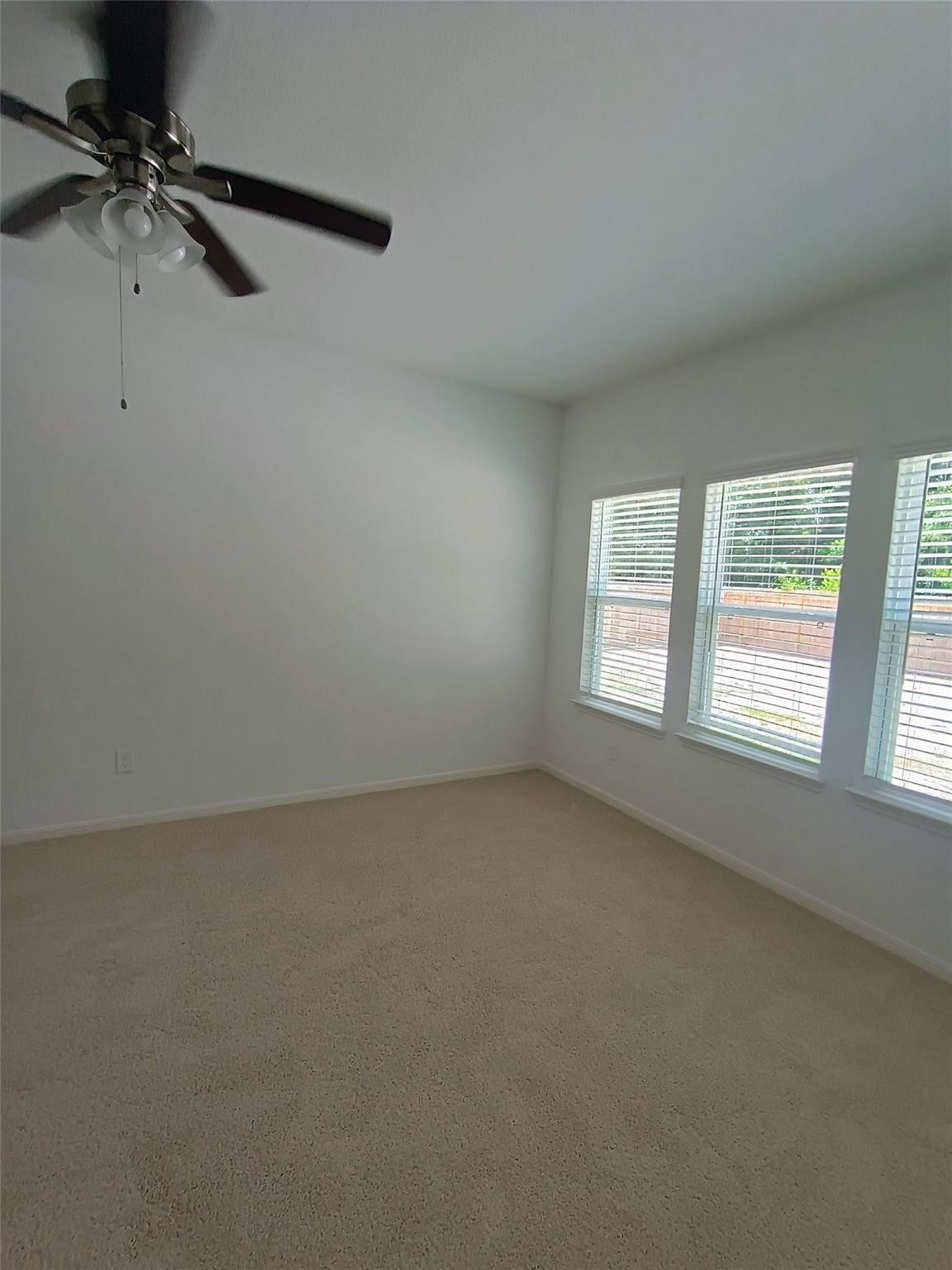 15924 Cy Young Court Splendora, TX 77372 - Photo 13 of 29 an empty room with a window