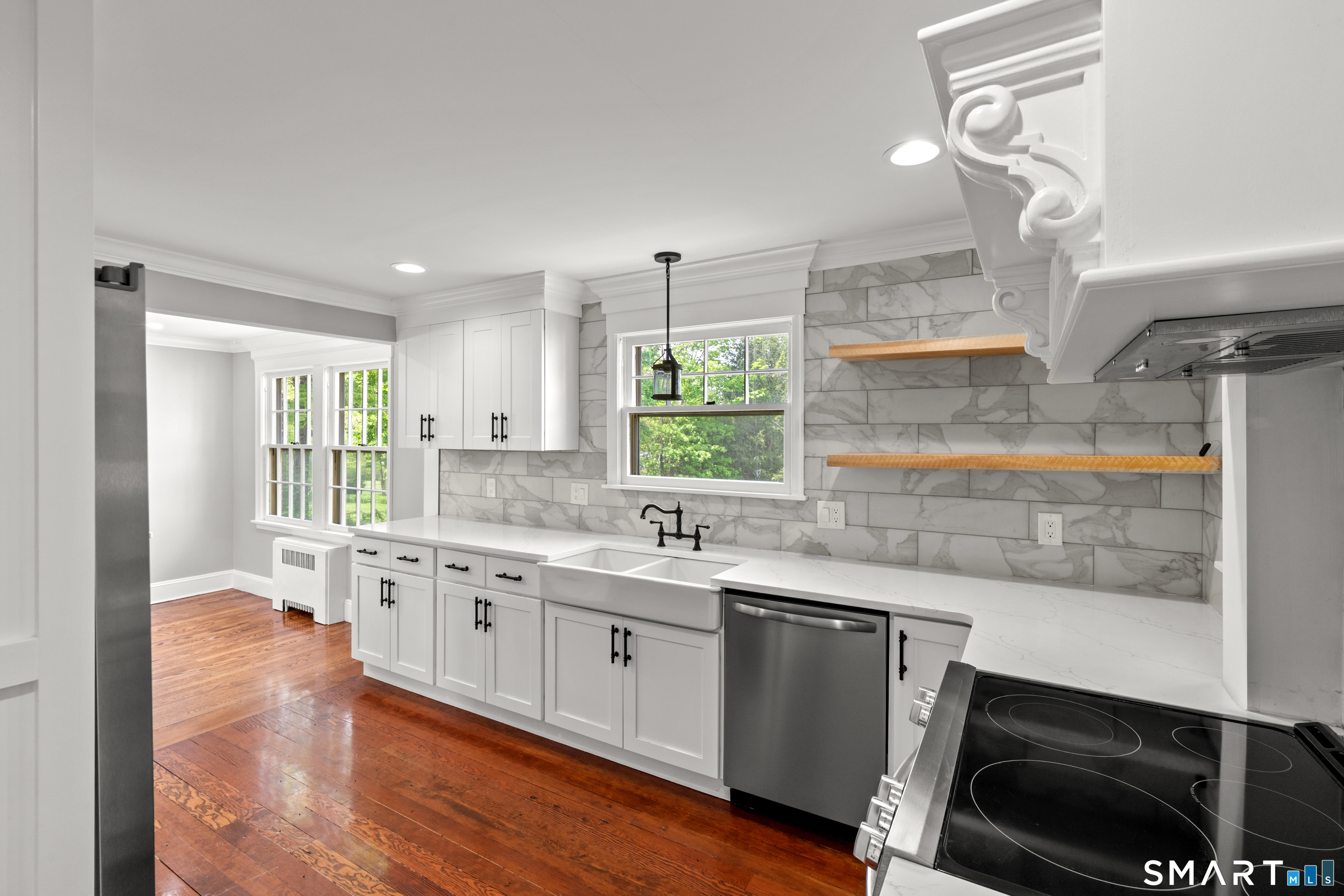551 North Main Street Suffield, CT 06078 - Photo 4 of 38 Beautiful updated kitchen with granite and stainless steel appliances.