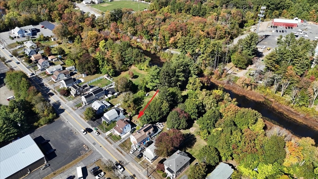 203 Pleasant Street Ashland, MA 01721 - Photo 13 of 33 an aerial view of residential houses with outdoor space