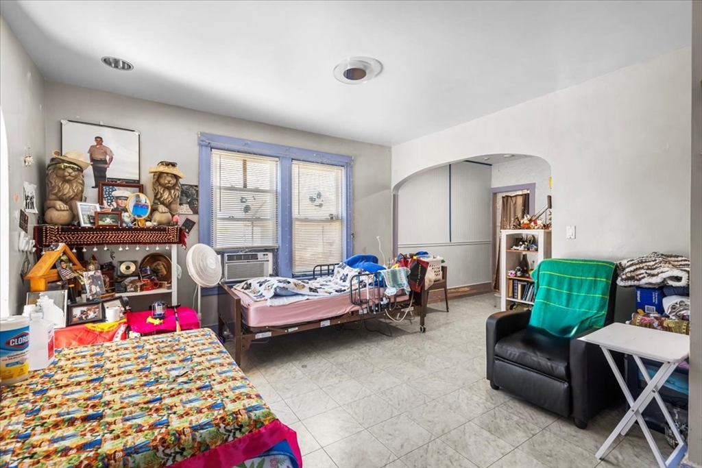 203 Pleasant Street Ashland, MA 01721 - Photo 19 of 33 a bedroom with furniture and a window