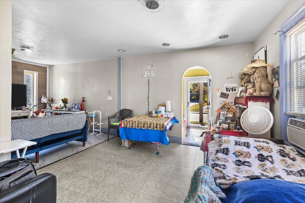 203 Pleasant Street Ashland, MA 01721 - Photo 20 of 33 a living room with furniture and a mirror
