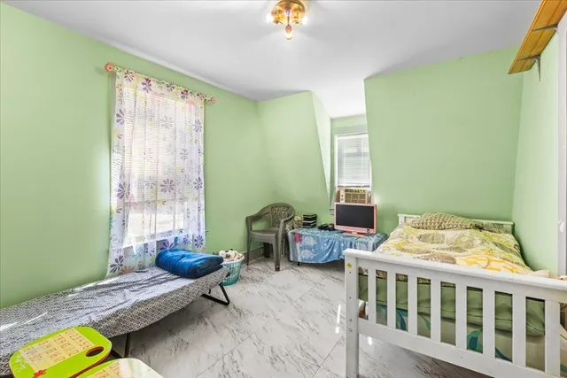 a bathroom with a sink mirror vanity and toilet