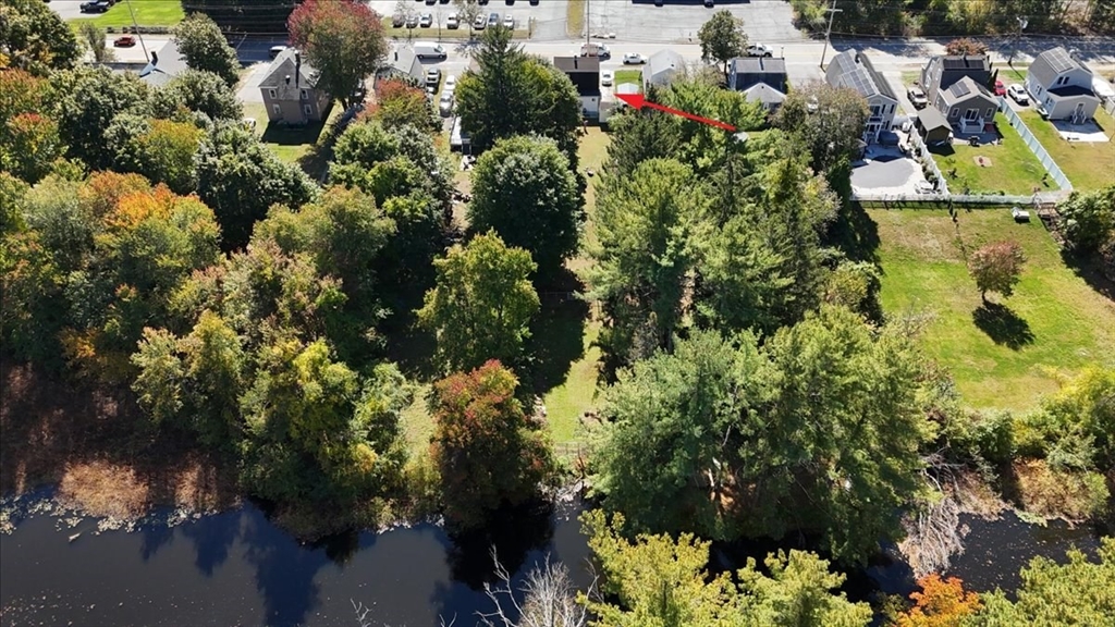 203 Pleasant Street Ashland, MA 01721 - Photo 7 of 33 a view of a house with a yard
