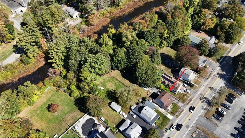 203 Pleasant Street Ashland, MA 01721 - Photo 10 of 33 an aerial view of residential houses with outdoor space