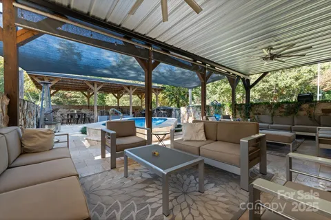 a outdoor living space with patio furniture and a potted plant
