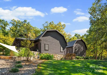 a view of backyard with garden and entertaining space
