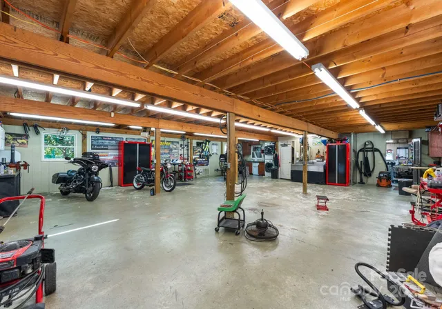 a view of a garage with gym equipment