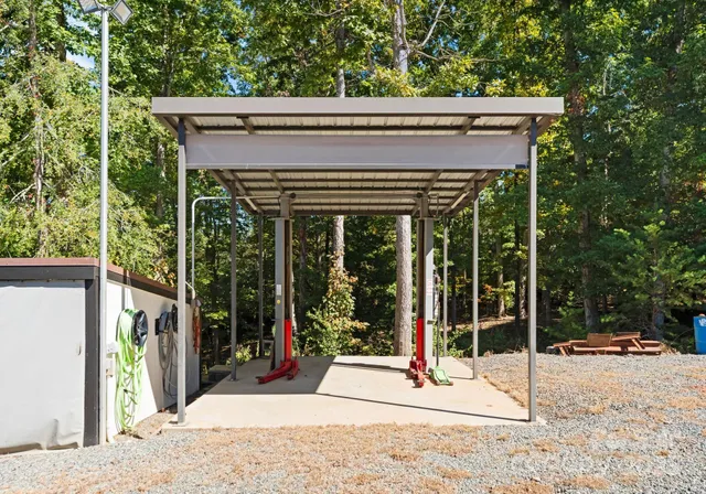 a side view of a house with a garage