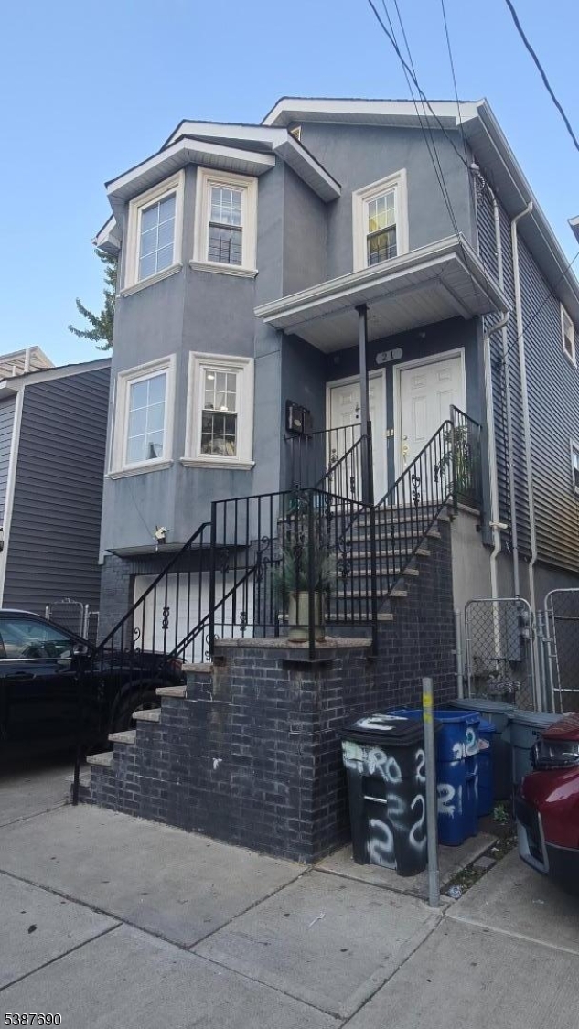 21 Rose Street Paterson, NJ 07501 - Photo 2 of 28 a view of a house with sitting area