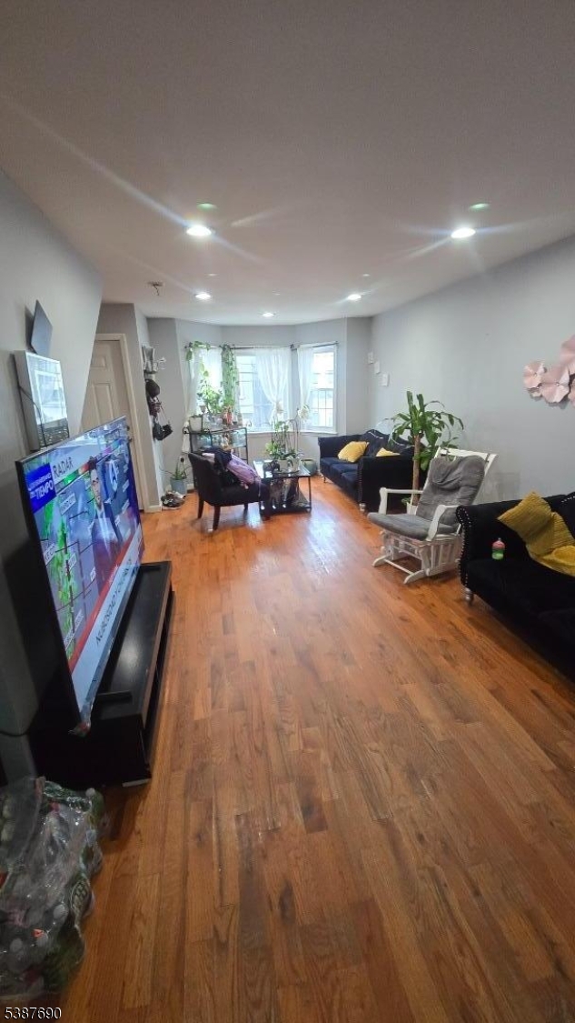 21 Rose Street Paterson, NJ 07501 - Photo 4 of 28 a view of a room with furniture and couch