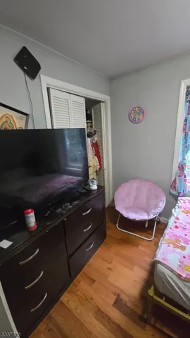 a room with furniture and flat screen tv