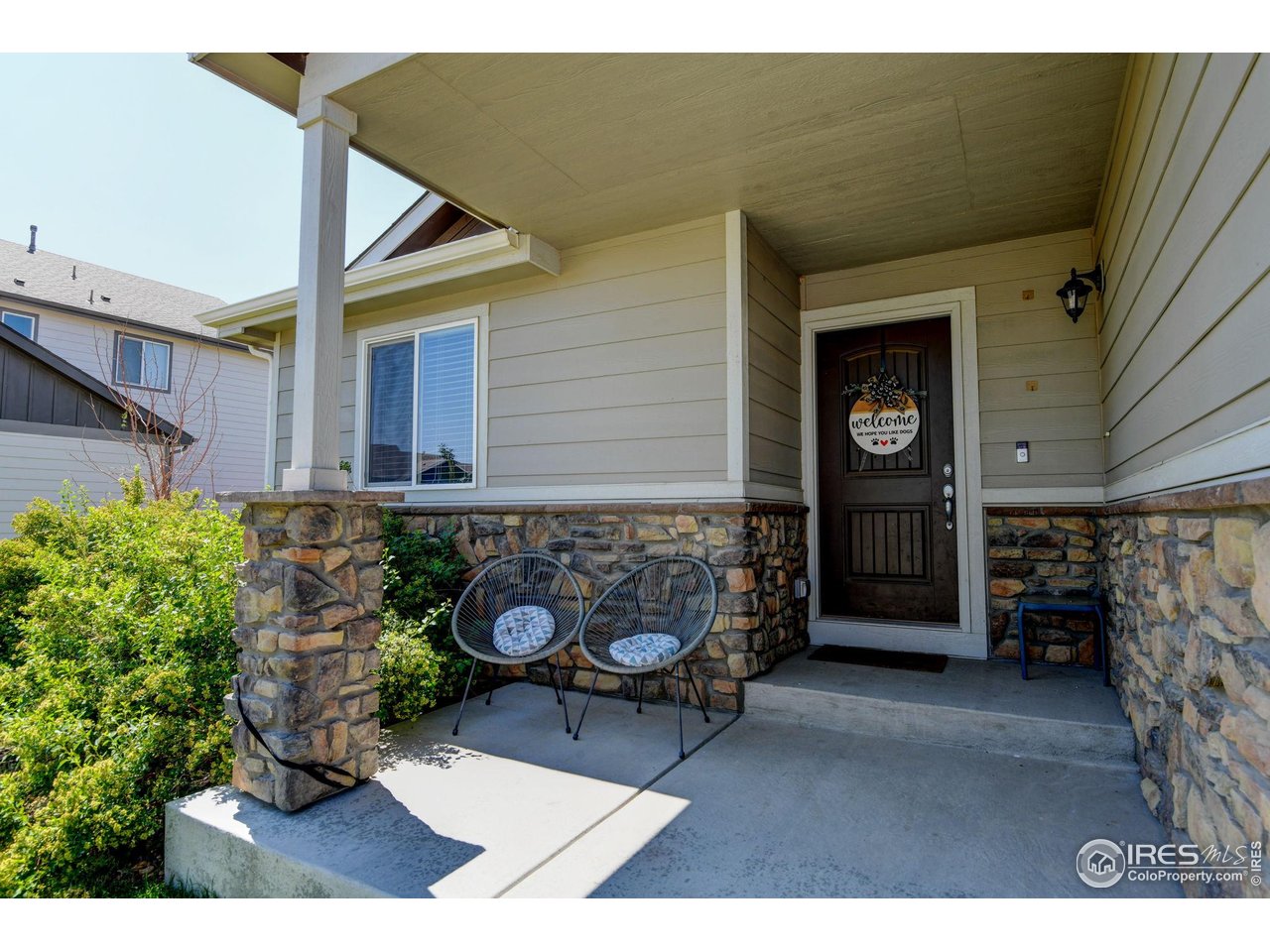 1295 Wild Basin Road Severance, CO 80550 - Photo 5 of 44 Welcoming covered front patio