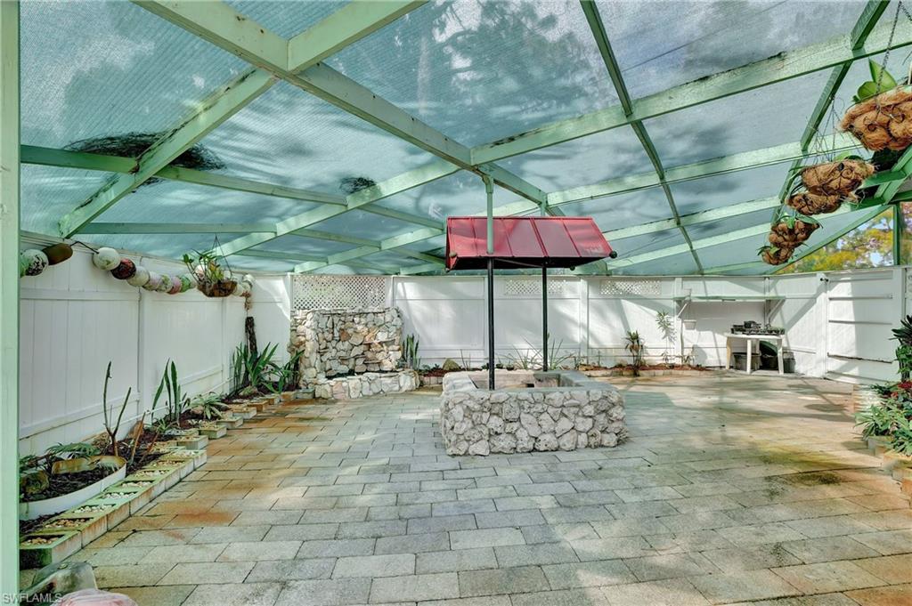 5405 Warren Street Naples, FL 34113 - Photo 33 of 37 Bonus enclosed and screened area with waterfall