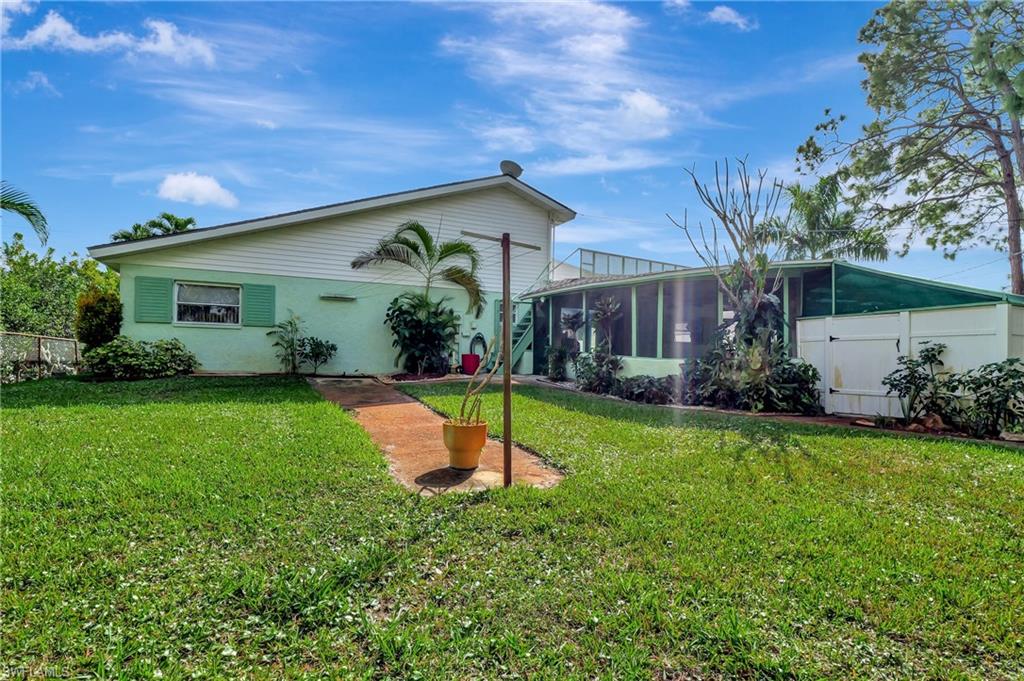 5405 Warren Street Naples, FL 34113 - Photo 37 of 37 Rear porch and bonus area