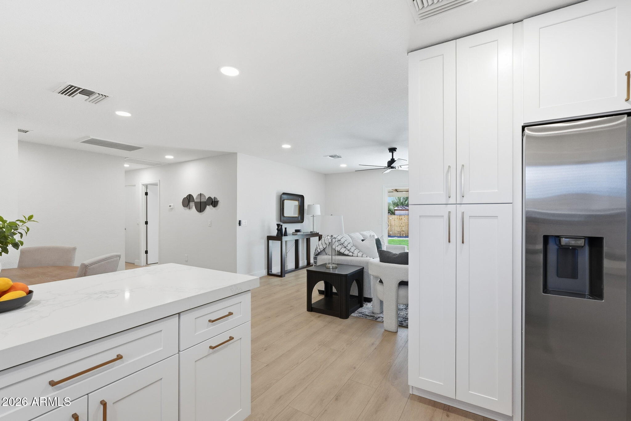 1336 South Cactus Road Apache Junction, AZ 85119 - Photo 15 of 37 a spacious bathroom with a sink and mirror