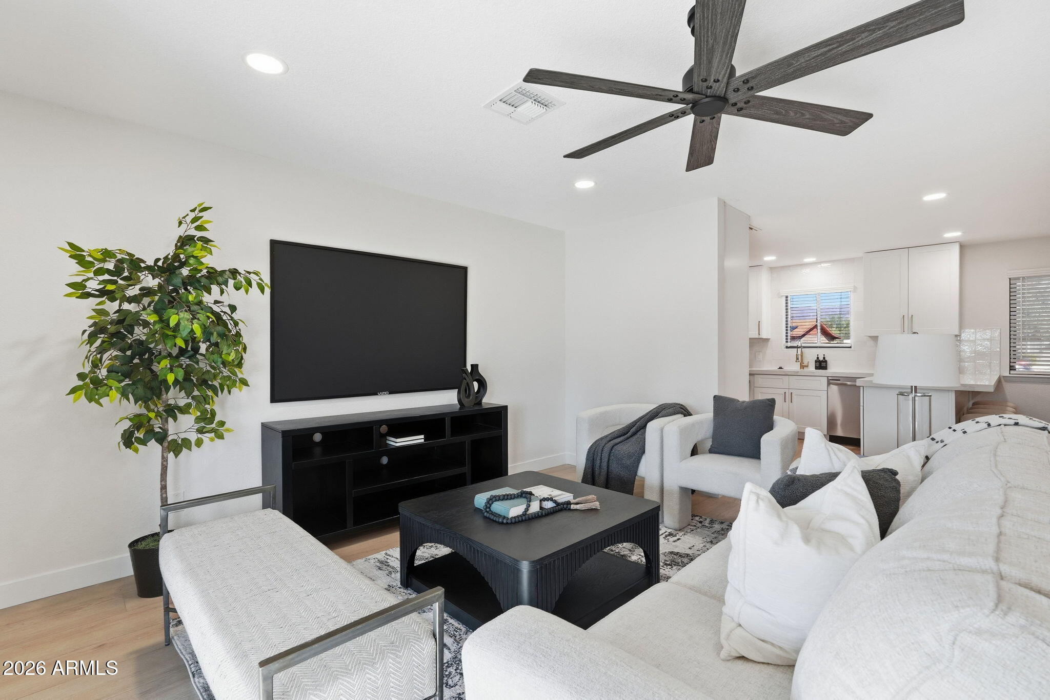 1336 South Cactus Road Apache Junction, AZ 85119 - Photo 18 of 37 a living room with furniture and a flat screen tv