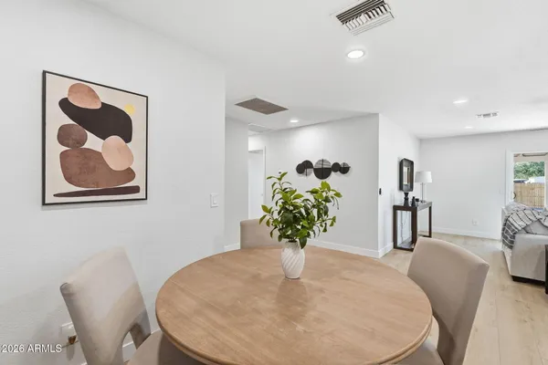 a view of a dining room with furniture