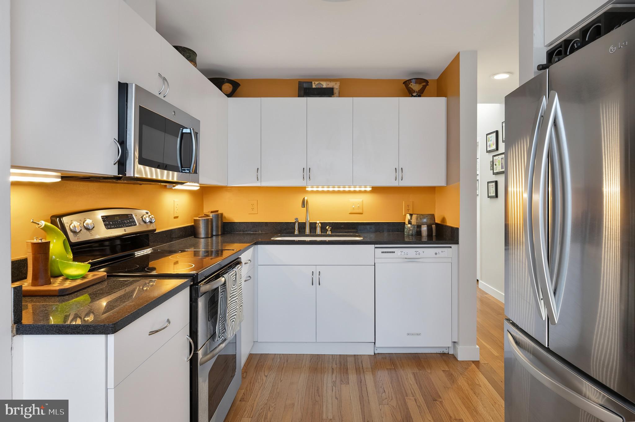 2205 Paul Spring Road Alexandria, VA 22307 - Photo 21 of 131 a kitchen with stainless steel appliances granite countertop a refrigerator and a stove top oven