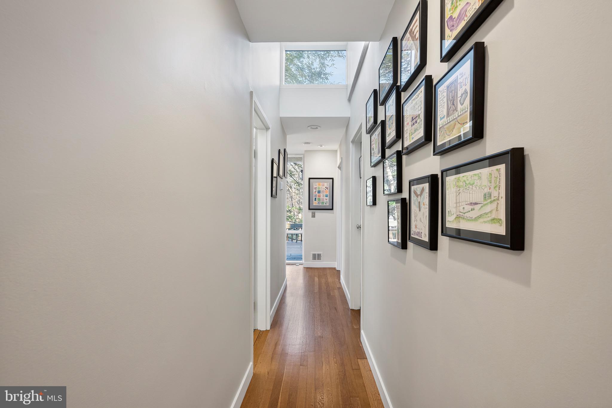 2205 Paul Spring Road Alexandria, VA 22307 - Photo 27 of 131 a view of a hallway with wooden floor and staircase