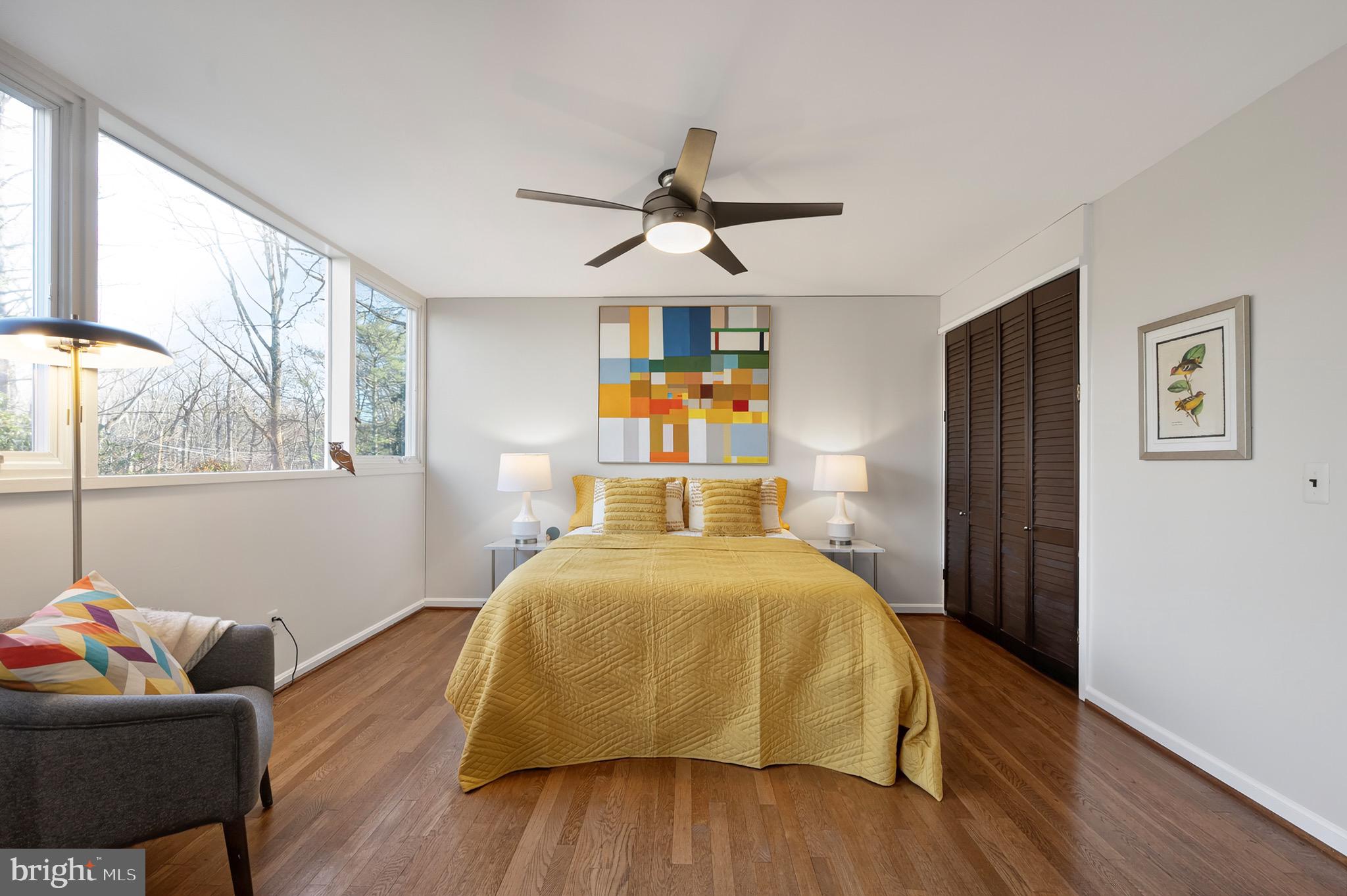 2205 Paul Spring Road Alexandria, VA 22307 - Photo 28 of 131 a bedroom with a bed and wooden floor