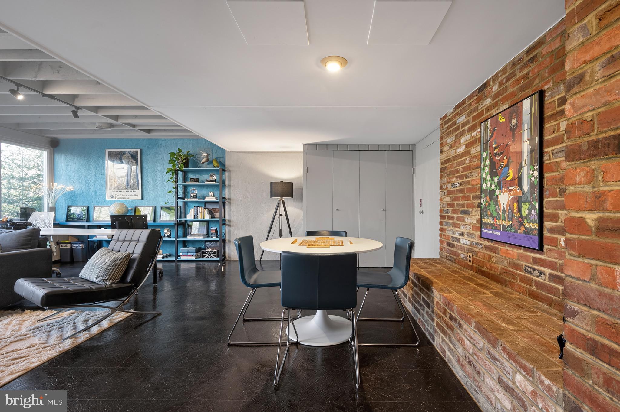 2205 Paul Spring Road Alexandria, VA 22307 - Photo 52 of 131 a view of a dining room with furniture window and wooden floor